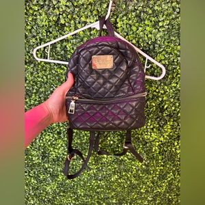 Small black Bebe backpack purse